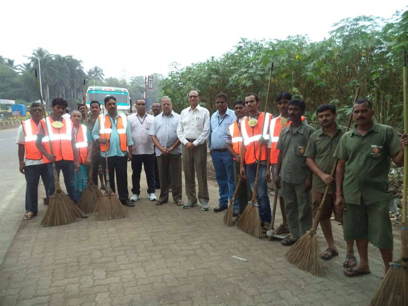 Sanitation workers on the road